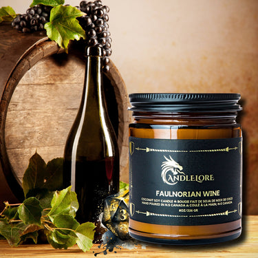 wine candle with grapes and wine beside it